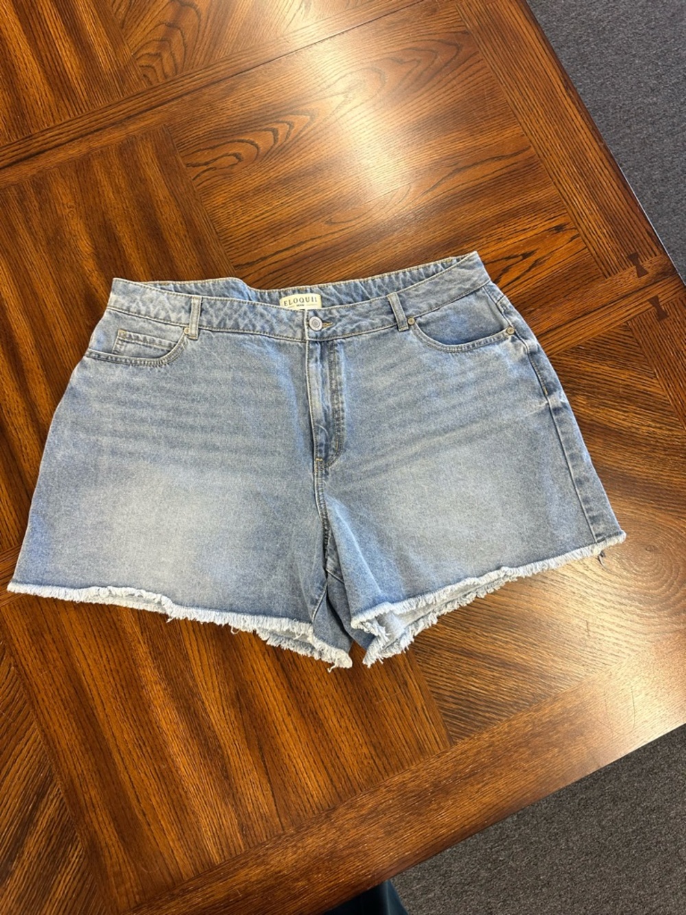 Eloquii Light Blue Frayed Hem Denim Shorts